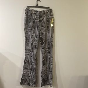 black and white pants with a chain belt